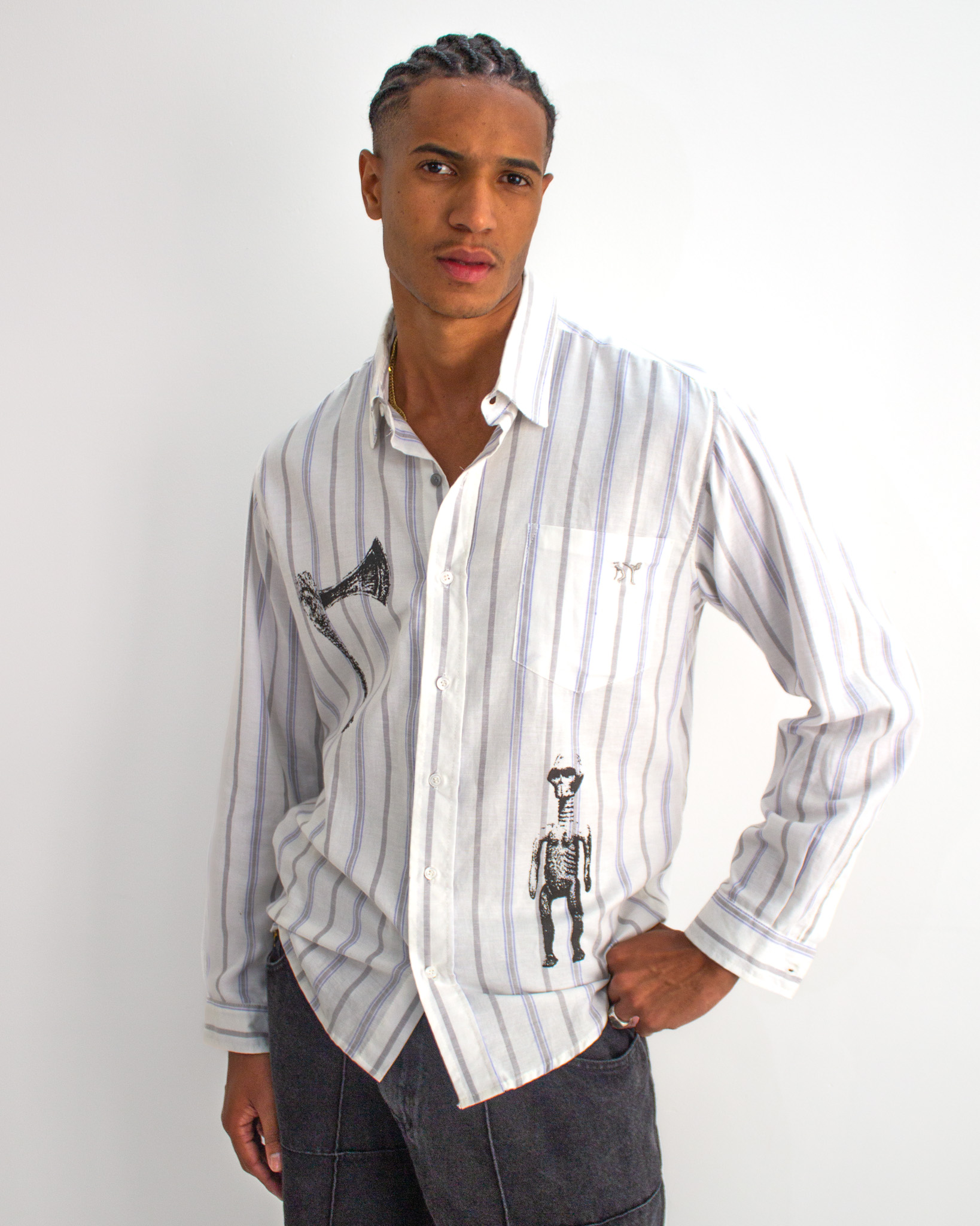 CAMISA LISTRADA MÁSCARAS ANCESTRAIS